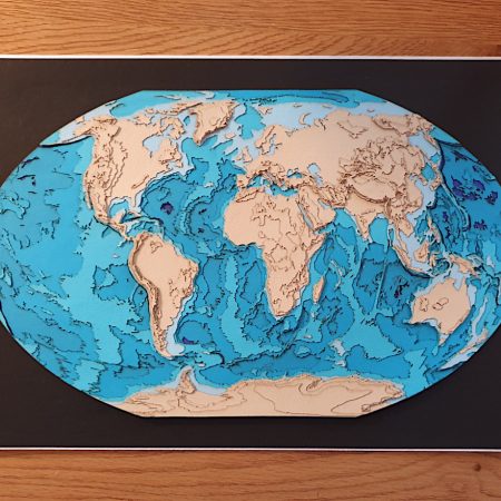3D world map showing relief and ocean depths in A4 format, handcrafted from layered cardboard - 3D karta svijeta s reljefom i dubinama oceana u A4 formatu, ručno izrađena od kartonskih slojeva